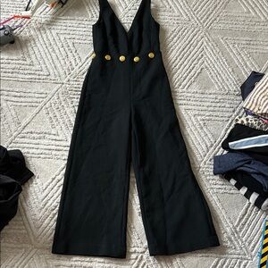 Tory Burch Elegant Black Jumpsuit with Gold Accents